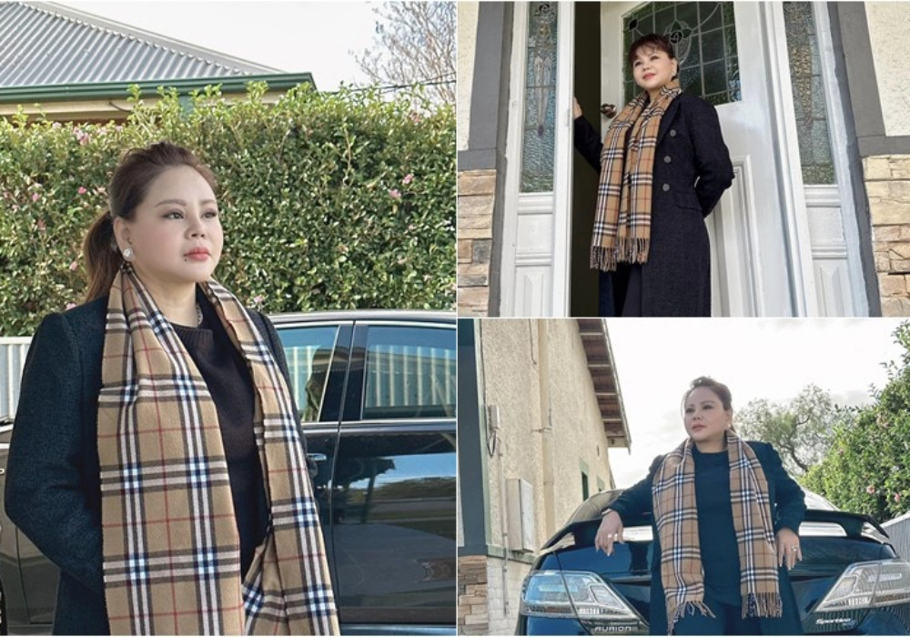 Lê Giang chụp ảnh trước ngôi nhà vừa tậu ở Australia. 