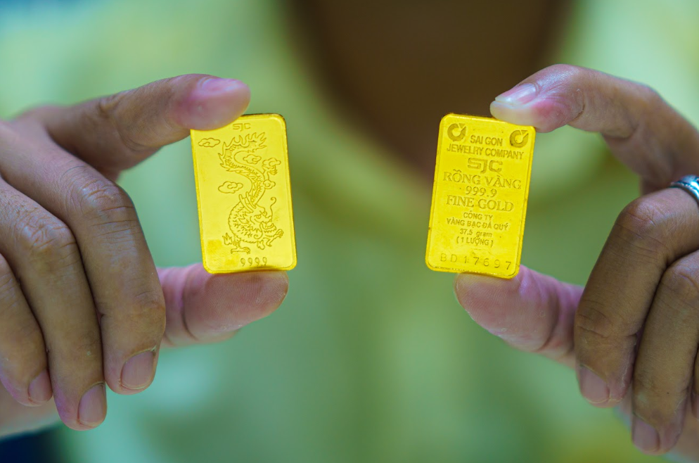 Vàng thế giới giảm mạnh sau khi leo lên mức cao kỷ lục mới. Ảnh: HH