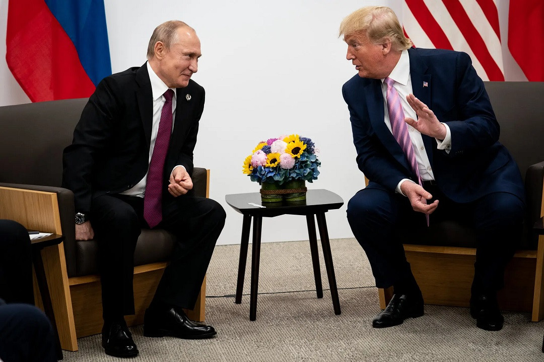 Tổng thống Nga Vladimir Putin và ông Donald Trump. Ảnh: NYT