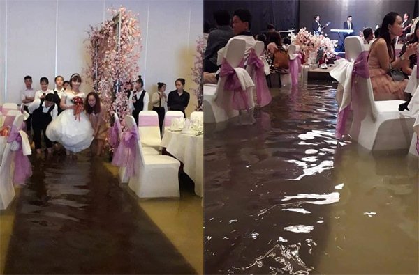 Những đám cưới kinh điển dịp bão về: Khách mặc áo mưa ăn cỗ, cô dâu lội nước vào lễ đường - 1 Những đám cưới kinh điển dịp bão về: Khách mặc áo mưa ăn cỗ, cô dâu lội nước vào lễ đường - 1