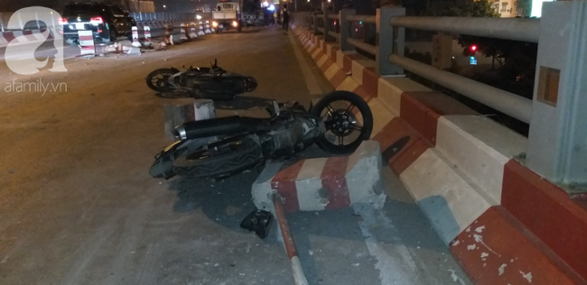 Hà Nội: Xe bồn nổ lốp lao vào dải phân cách trên cầu Thanh Trì khiến 4 người đi xe máy bị thương - 10 Hà Nội: Xe bồn nổ lốp lao vào dải phân cách trên cầu Thanh Trì khiến 4 người đi xe máy bị thương - 10