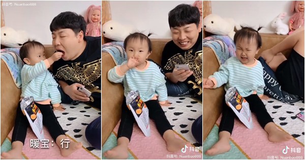 Đút đồ ăn cho bố lại bị nuốt cả tay, cô bé có phản ứng bất ngờ khiến dân mạng cười lăn cười bò - 2 Đút đồ ăn cho bố lại bị nuốt cả tay, cô bé có phản ứng bất ngờ khiến dân mạng cười lăn cười bò - 2