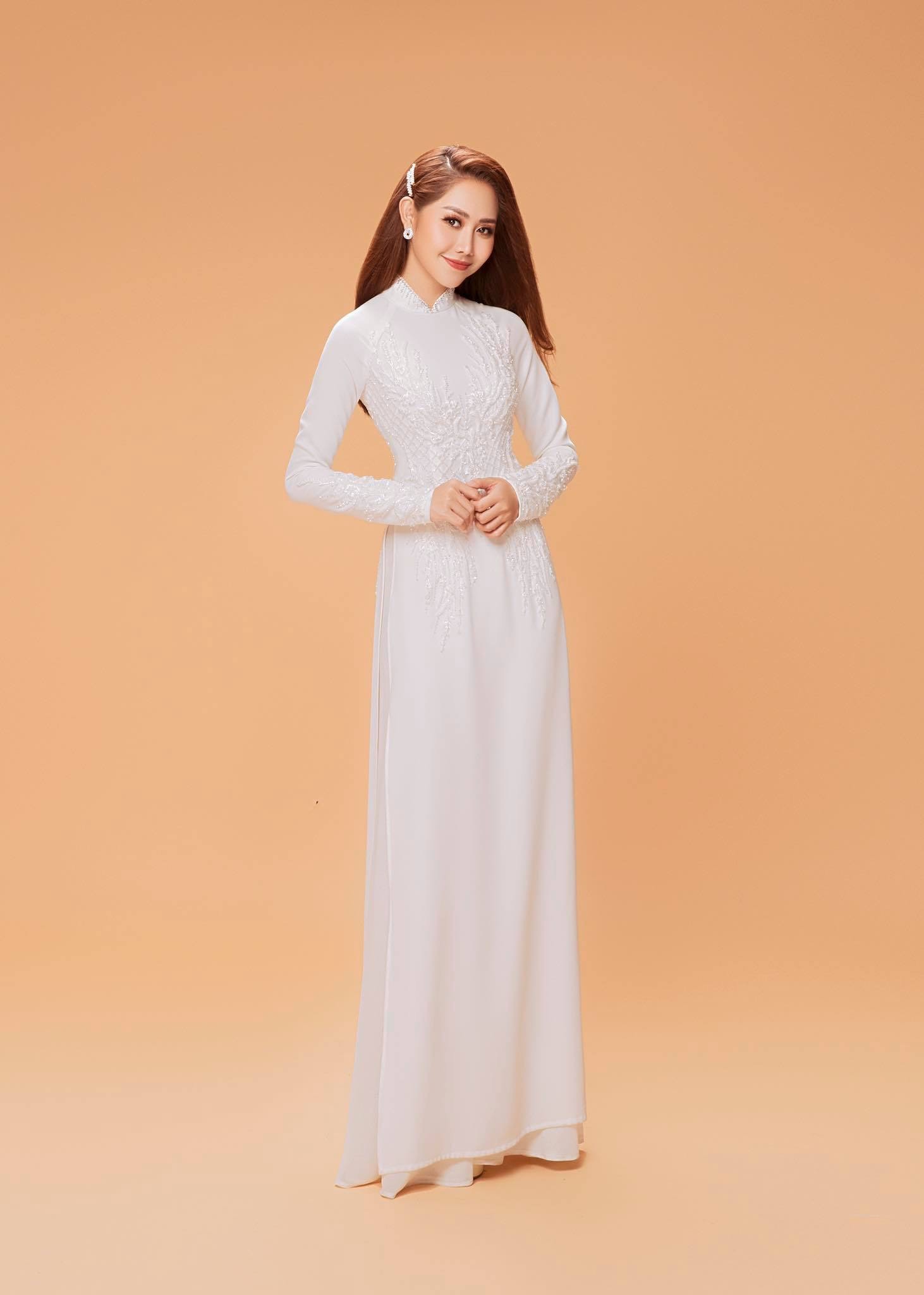 Tường Vi xinh đẹp, khoe sắc quyến rũ với áo dài - 16 Tường Vi xinh đẹp, khoe sắc quyến rũ với áo dài - 16