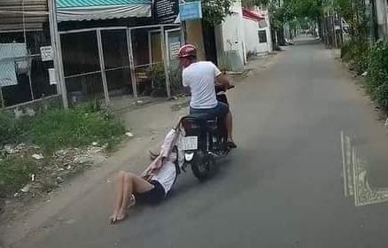 Tên cướp kéo lê cô gái hàng trăm mét ở TP.HCM