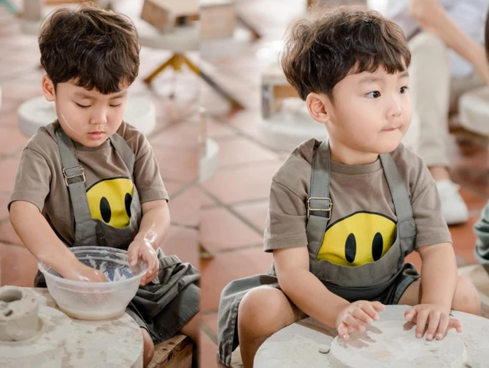 Bé Bo được Hòa Minzy cho tiếp xúc với các hoạt động trải nghiệm.