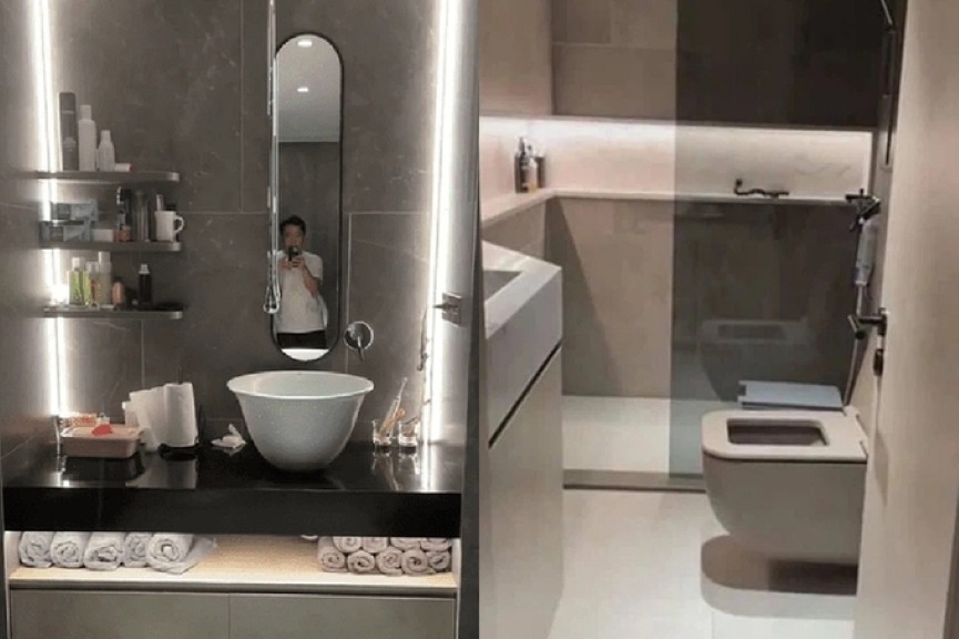 Phòng tắm được thiết kế thông qua với phòng ngủ, với tone màu xám trắng làm chủ đạo.Điểm nhấn của dàn đèn led âm tường sang trọng, có khả năng điều chỉnh nhiều góc độ ánh sáng