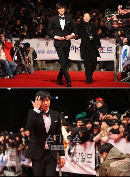 Lee Min Ho vẫn cố gắng mỉm cười và tiếp tục bước đi