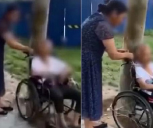 Trói cụ già ngồi xe lăn vào gốc cây, thái độ của người giúp việc còn trơ trẽn hơn khi bị phát hiện