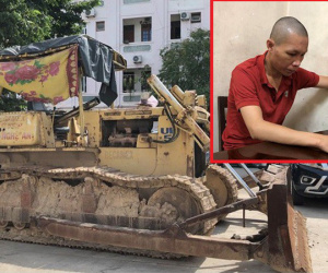 Giả vờ khách hàng, thuê công ty đến cẩu trộm máy ủi hơn 10 tấn