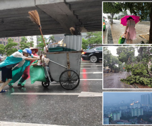 Ảnh: Người dân Hà Nội oằn mình trong mưa lớn và gió lốc mạnh, bão số 3 đã suy yếu thành áp thấp nhiệt đới