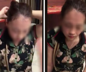 Bị bắt gặp khi đang tình tứ với chồng người khác trên ô tô, cô bồ nhí vẫn thản nhiên buộc lại tóc, mặc kệ chị vợ gào thét