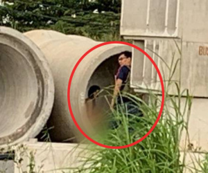 Cô gái khỏa thân giữa ban ngày trong ống cống để nhóm nam thanh niên... thi nhau chụp ảnh ở Sài Gòn