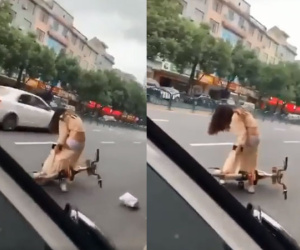Cô gái trẻ để váy vướng vào xe đạp, lộ cả nội y nhưng dân mạng bảo 'sao kéo hoài, kéo mãi mà cái quần nó chẳng về đúng chỗ'!?