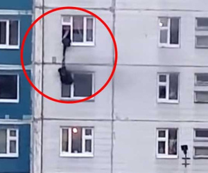 ‘Anh hùng’ lạ mặt thả dây qua cửa sổ, cứu cô gái trẻ khỏi căn hộ bốc cháy