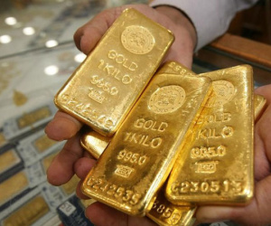 Giá vàng trong nước và thế giới tiến sát nhau