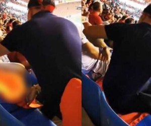 Người đàn ông có hành vi 'phản cảm' với Quốc kỳ trong sân Mỹ Đình có bị xử lý hình sự?