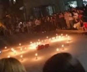 Thanh niên 'số nhọ' dày công xếp nến hình trái tim rồi ôm hoa đứng dưới sân ký túc xá, gọi đúng họ đúng tên crush để tỏ tình nhưng phát hiện...nhầm khu