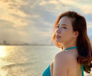 Đan Lê thả dáng với bikini, tự tin vì được ông xã Khải Anh chụp