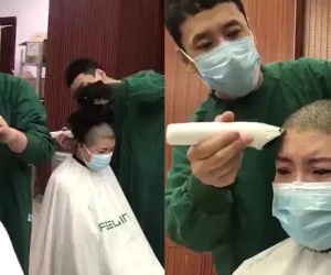 Tranh cãi việc nữ y tá Trung Quốc phải cạo đầu khi tới làm việc ở vùng dịch Covid-19