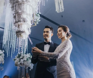 Hôn lễ thế kỷ xa hoa bậc nhất của cặp đôi vàng showbiz Malaysia: Cô dâu diện váy 58 tỷ đồng, bánh cưới 8 tầng 'úp ngược'