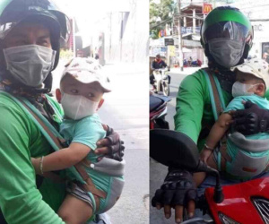 Nghẹn ngào xúc động với câu chuyện người bố ôm con đi chạy xe ôm nhưng dân tình vẫn còn thắc mắc điều này
