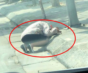 Giữa trưa hè 40 độ, người phụ nữ gục bên lề đường khiến nhiều người hoang mang nhưng lý do thực sự lại dở khóc dở cười