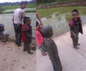 Nghỉ lễ, bố đèo con đi chơi nhưng phi xuống ruộng, bộ dạng của 2 cậu bé khiến dân mạng không thể nhịn cười