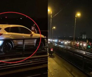 Bất chấp biển cấm, xế hộp Mazda CX5 vẫn ngang nhiên đi trên cầu Long Biên gây ùn tắc