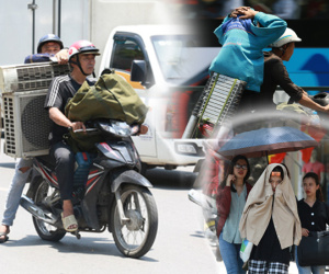 Hà Nội: Sinh viên nhăn mặt, người lao động oằn mình di chuyển dưới nắng nóng như thiêu đốt