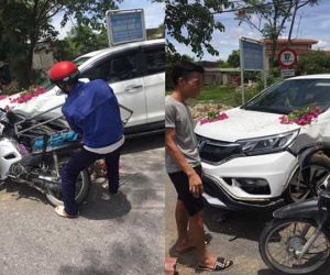 Thanh niên chạy xe máy đâm móp ô tô, gia đình lao đến nạt nộ, phản ứng của nữ tài xế khiến tất cả nể phục