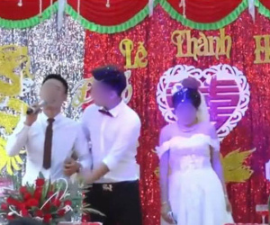 Đang đám cưới rình rang, chú rể đột nhiên ôm chầm lấy MC rồi bỏ chạy để mình cô dâu cười khúc khích trên sân khấu