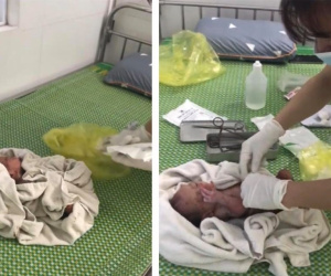 Giải cứu bé sơ sinh bị bỏ rơi mắc kẹt trong khe tường chật hẹp giữa 2 ngôi nhà