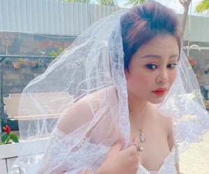 Lê Giang khoe ảnh diện váy cưới nóng bỏng kèm tuyên bố 'Hôm nay em lên xe hoa', bạn bè và khán giả bay vào chúc mừng