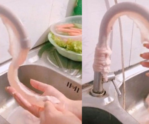 Đoạn video clip cô gái bày mẹo xỏ ruột heo vào vòi nước rồi xả nước để rửa sạch gây tranh cãi