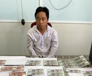 Khởi tố 2 kẻ mở 'xưởng' in tiền giả