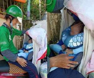 Em bé 8 tháng tuổi đã phải rong ruổi theo bố đi chở xe ôm khiến cộng đồng mạng thương cảm
