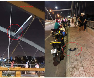 Thanh niên để xe và dép giữa cầu rồi biến mất, tất cả nháo nhác tìm trên sông thì sững người vì cảnh trước mắt
