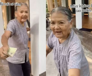 Hình ảnh bà nội chạy theo dúi vào tay cháu trai tờ tiền và nói một câu khiến bao người rơi nước mắt