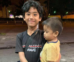 Bế em đi ăn xin để san sẻ gánh nặng cho mẹ, cậu bé 12 tuổi bộc bạch: 'Em chỉ muốn đi học lại!'