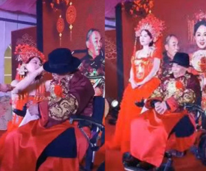 Thầy thuốc 80 tuổi ngồi xe lăn cưới học trò 42 tuổi