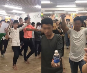 Cận cảnh giờ học của hội 'tỷ phú tương lai' gây choáng: Lớp cả trăm người tay cầm chai nước, co quắp 1 chân,hô khẩu hiệu làm giàu