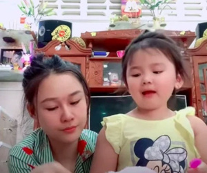 Hậu ồn ào, vợ Vân Quang Long lộ diện với đôi mắt sưng húp bên con gái, hình ảnh ngây thơ của bé Helen nhìn mà xót