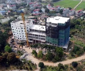 Cận cảnh công trình cao 9 tầng 'mọc' trên đất trồng cây ở Sơn Tây
