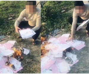 Biết vợ sắp cưới có bầu với người khác, chàng trai vừa khóc vừa đốt hàng trăm tấm thiệp cưới ở bãi rác