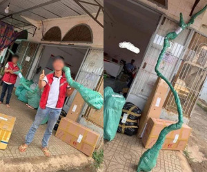 Nhìn đơn hàng 'dài như cái cây' khiến hai người khiêng còn chật vật, shipper tái mặt nhưng vẫn cố gắng đi giao