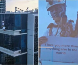 Nhìn ra cửa kính tòa nhà từ tầng 17, cô gái ngạc nhiên khi thấy bạn trai treo lơ lửng, nội dung trên các tờ giấy anh ta cầm mới bất ngờ!