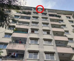 Hà Nội: Cảnh sát giải cứu người phụ nữ ngồi chênh vênh ở lan can tầng 10 chung cư