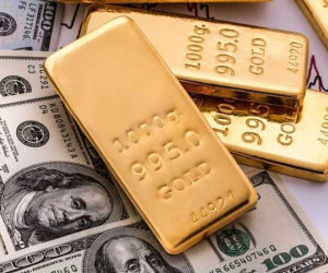 Giá vàng bật tăng trở lại, USD tiếp tục lao dốc