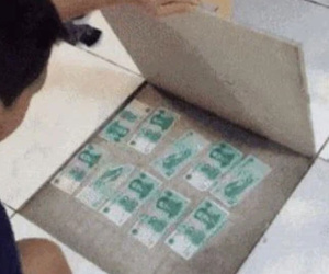Vợ phát hiện 'quỹ đen' của chồng từ một viên gạch nứt