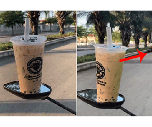 Để cốc trà sữa lên gương xe máy khi di chuyển, thanh niên khiến dân mạng hốt hoảng vì lo sợ nguy hiểm